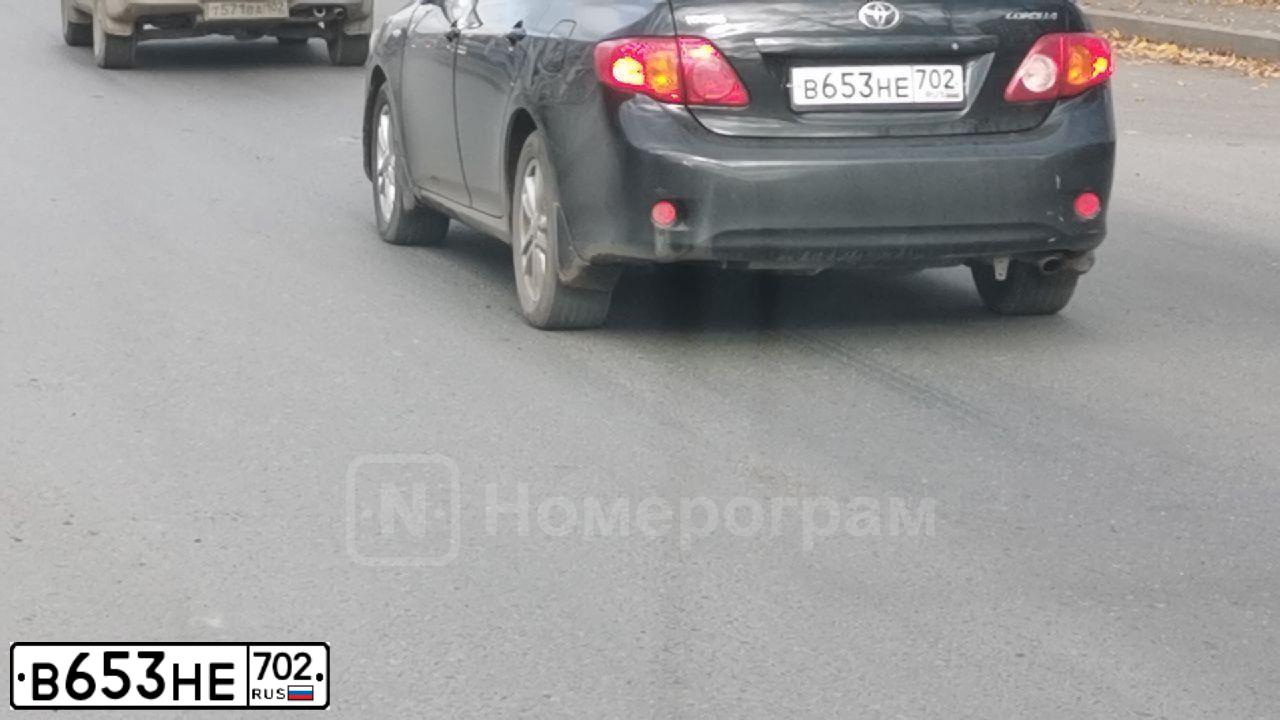 Фото автомобиля TOYOTA COROLLA, 2010 — госномер В653НЕ702. Цвет: ЧЕРНЫЙ
