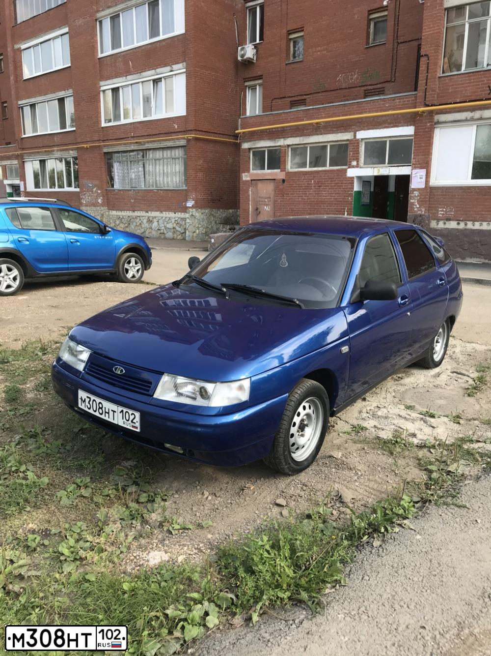 Фото автомобиля LADA 2112, 2007 — госномер Н474ОТ702. Цвет: синий