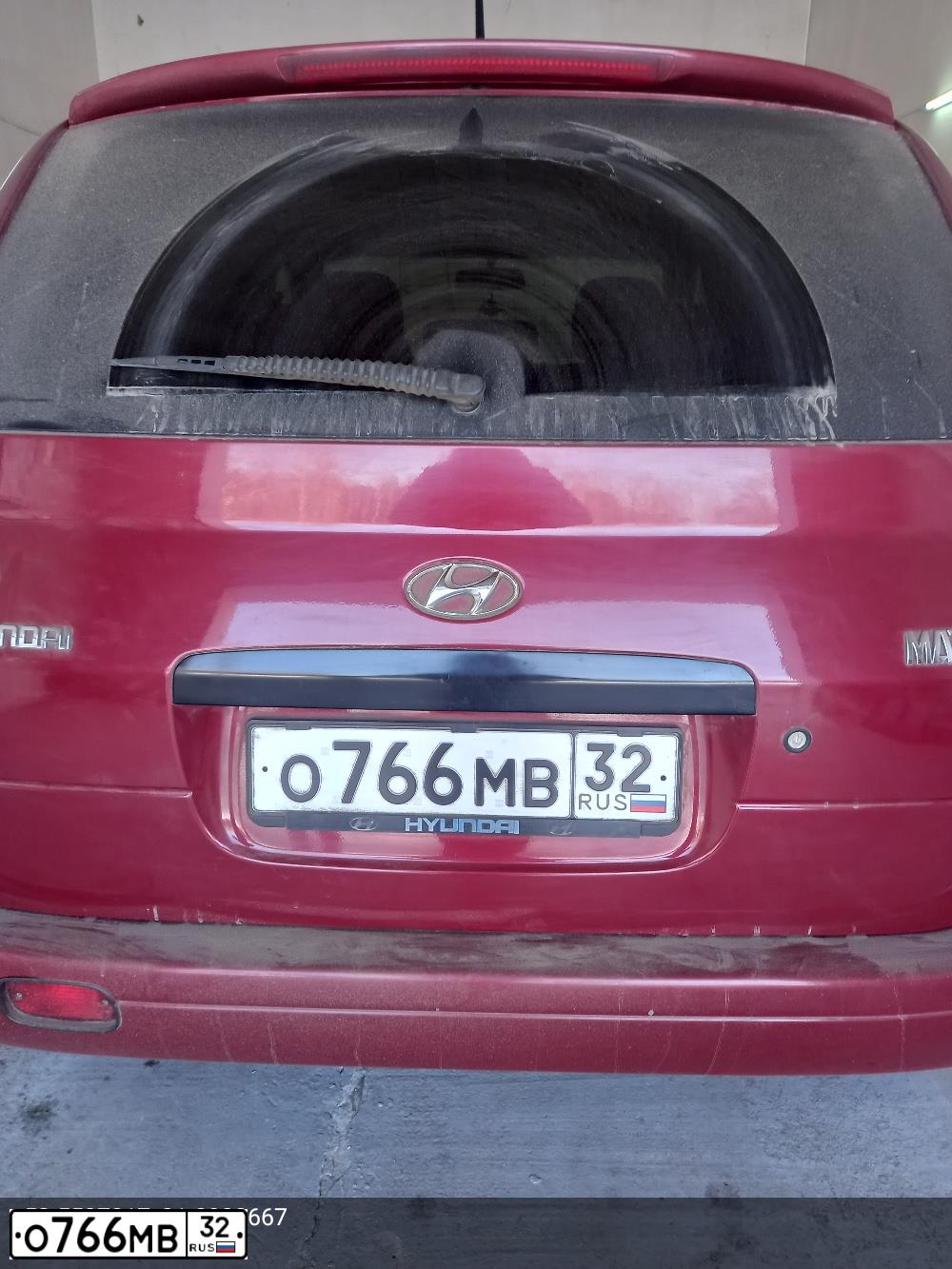 Фото автомобиля HYUNDAI MATRIX, 2006 — госномер Т231СН33. Цвет: Красный