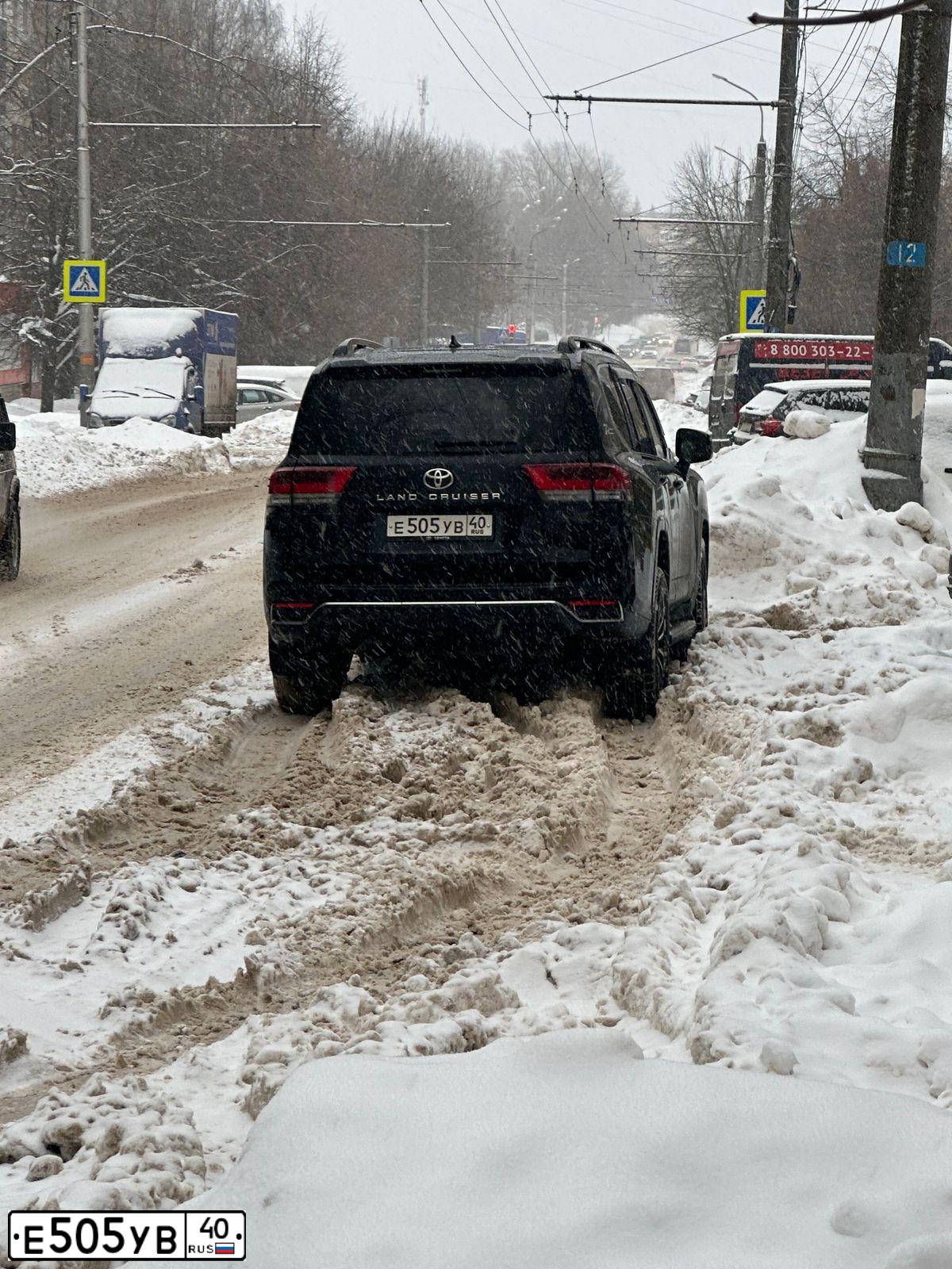 Фото автомобиля NISSAN X-TRAIL, 2007 — госномер Е505УВ40. Цвет: ЧЕРНЫЙ