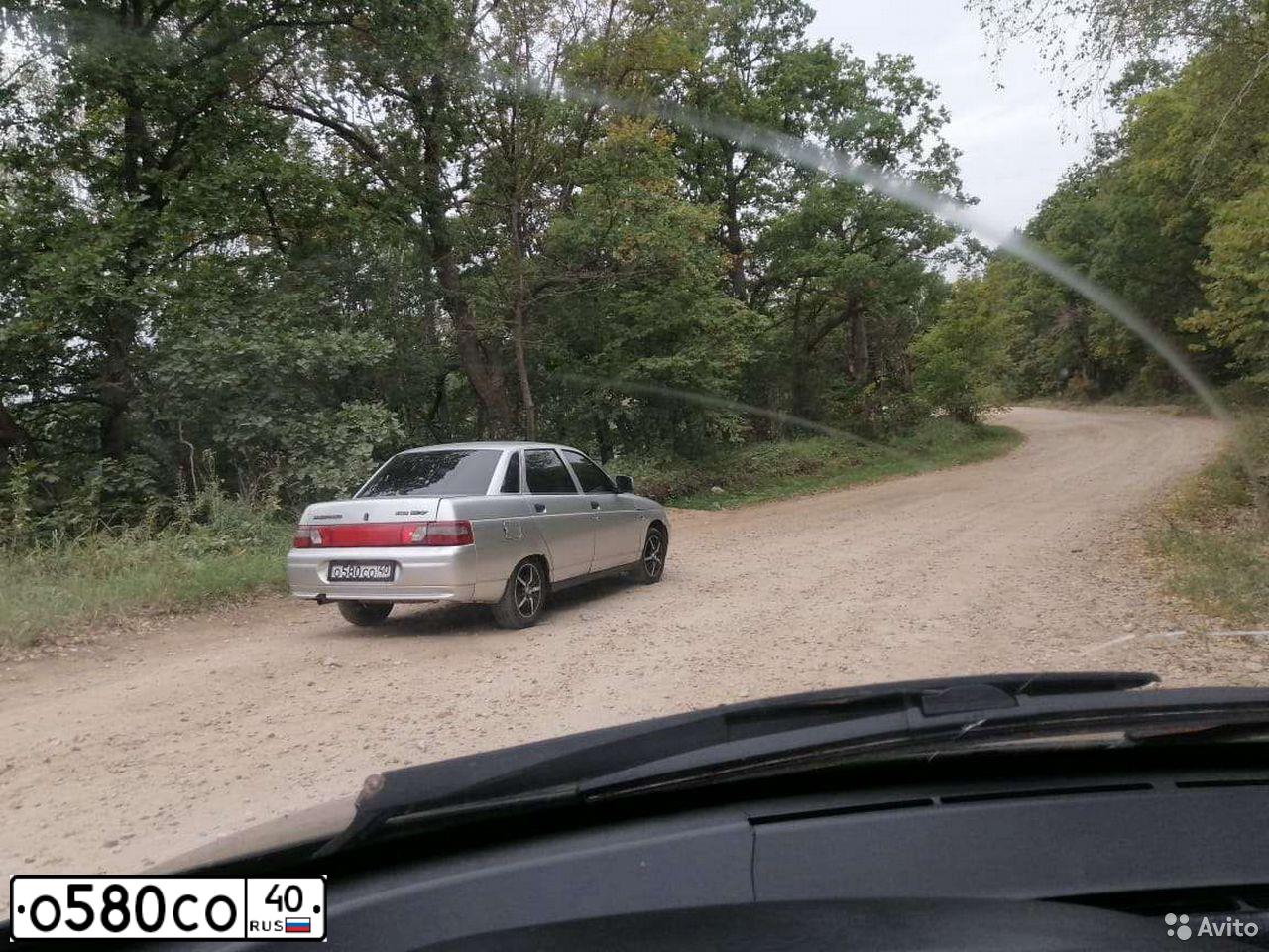 Фото автомобиля LADA 2110 LADA, 2006 — госномер Р055РР32. Цвет: КРАСНЫЙ