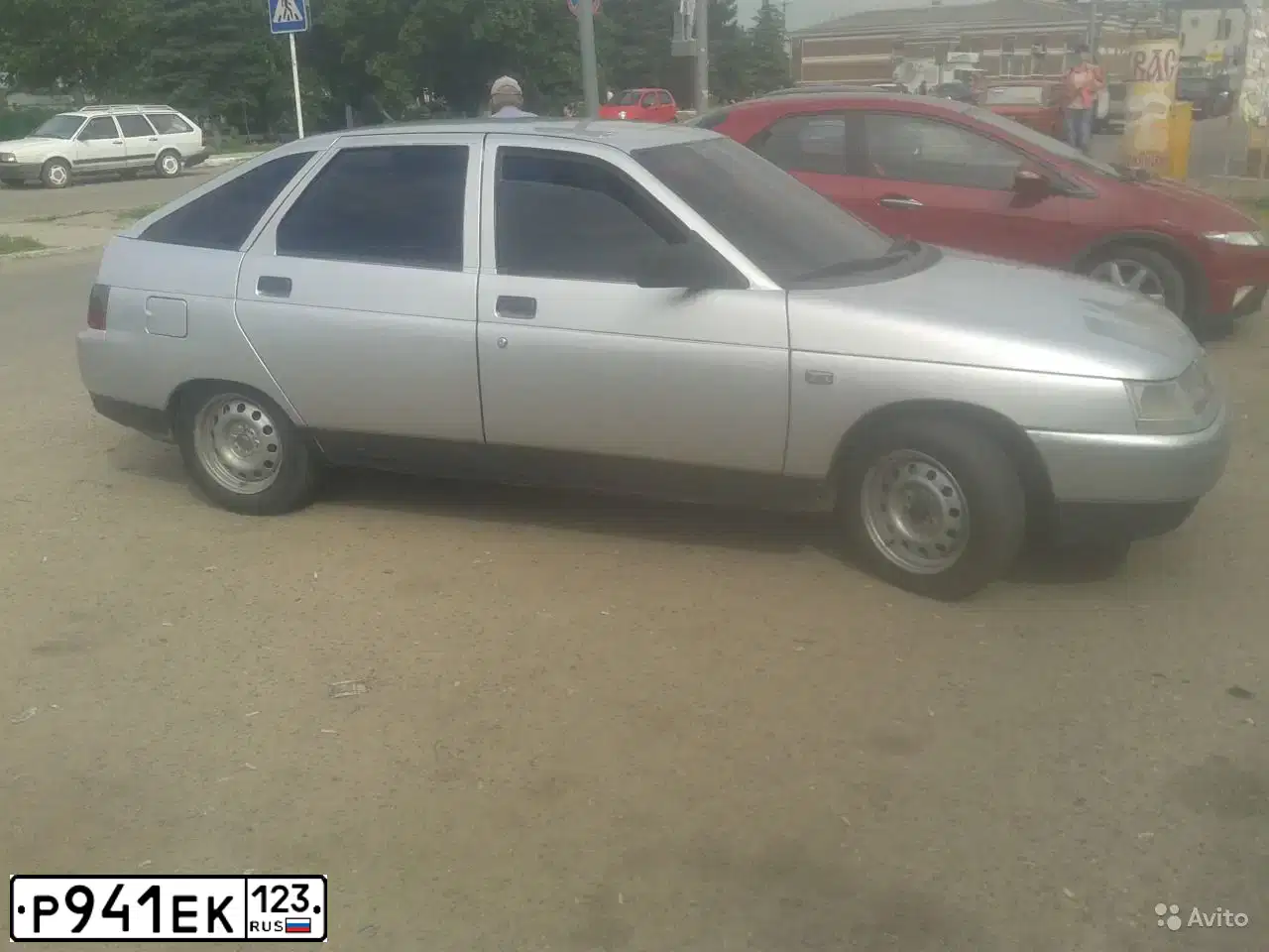 Фото автомобиля LADA 2112, 2002 — госномер Р941ЕК123. Цвет: СВЕТЛО-СЕРЕБРИСТЫЙ МЕТАЛЛ