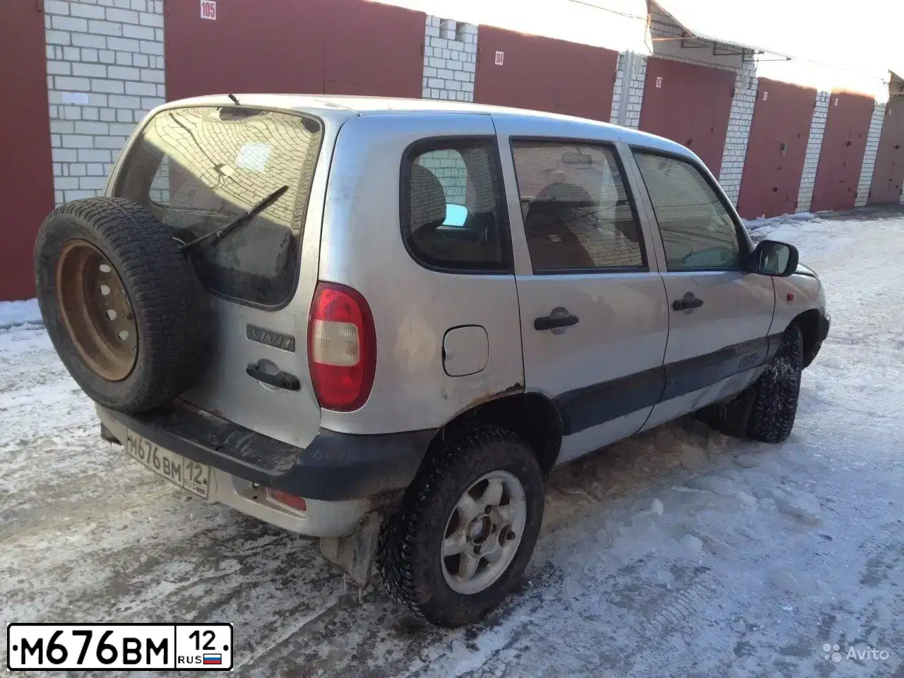 Фото автомобиля CHEVROLET NIVA, 2004 — госномер Р200АК716. Цвет: Светло-серебристый металик
