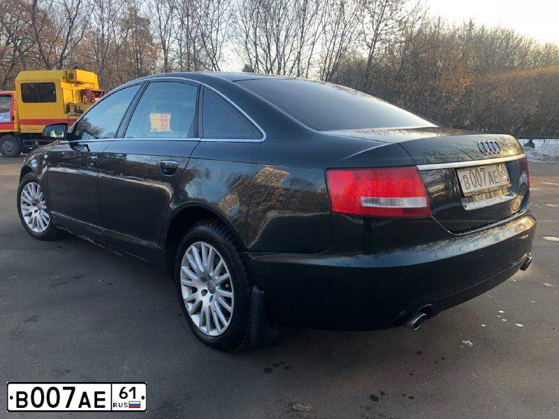 Фото автомобиля OPEL ASTRA, 2012 — госномер Е909ВЕ761. Цвет: ЧЕРНЫЙ