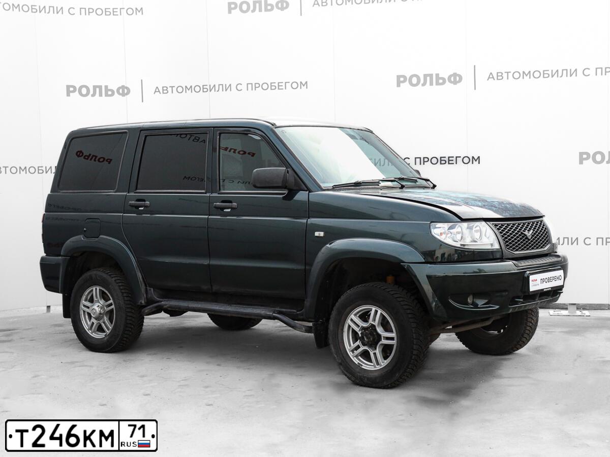 Фото автомобиля UAZ 3163 PATRIOT, 2011 — госномер Т246КМ71. Цвет: АМУЛЕТ МЕТАЛЛИК