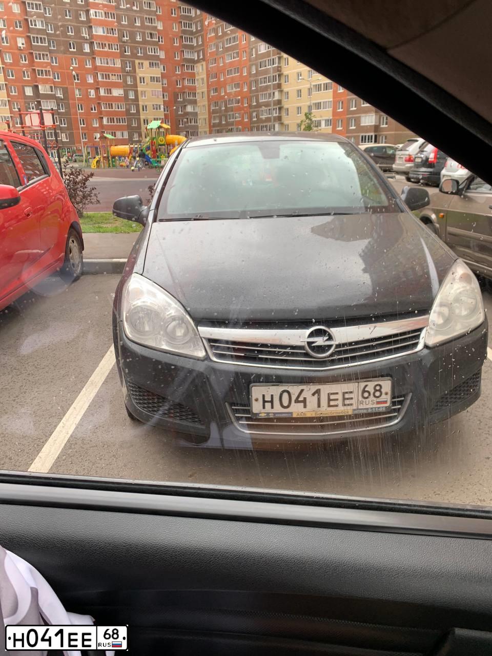 Фото автомобиля OPEL ASTRA, 2012 — госномер Н041ЕЕ68. Цвет: ЧЕРНЫЙ