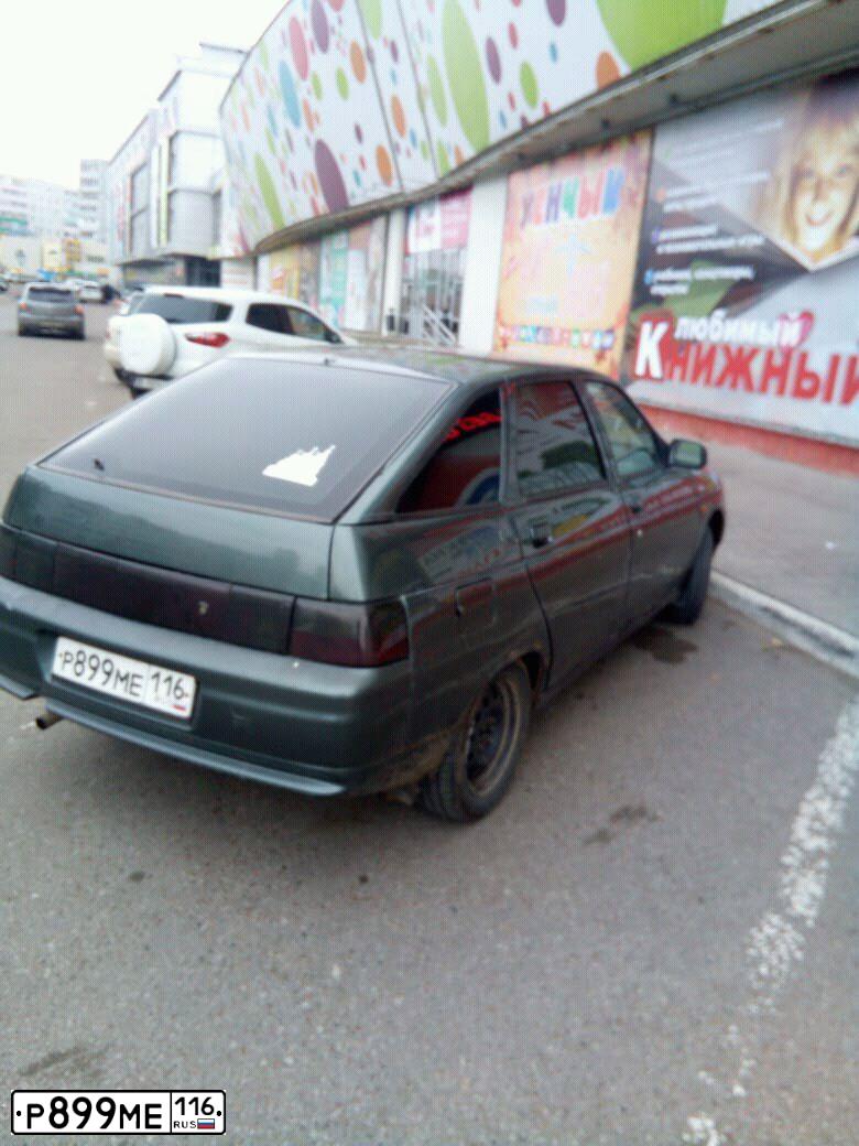 Фото автомобиля LADA 2112, 2006 — госномер Е409РО702. Цвет: Серо-сине-зеленый
