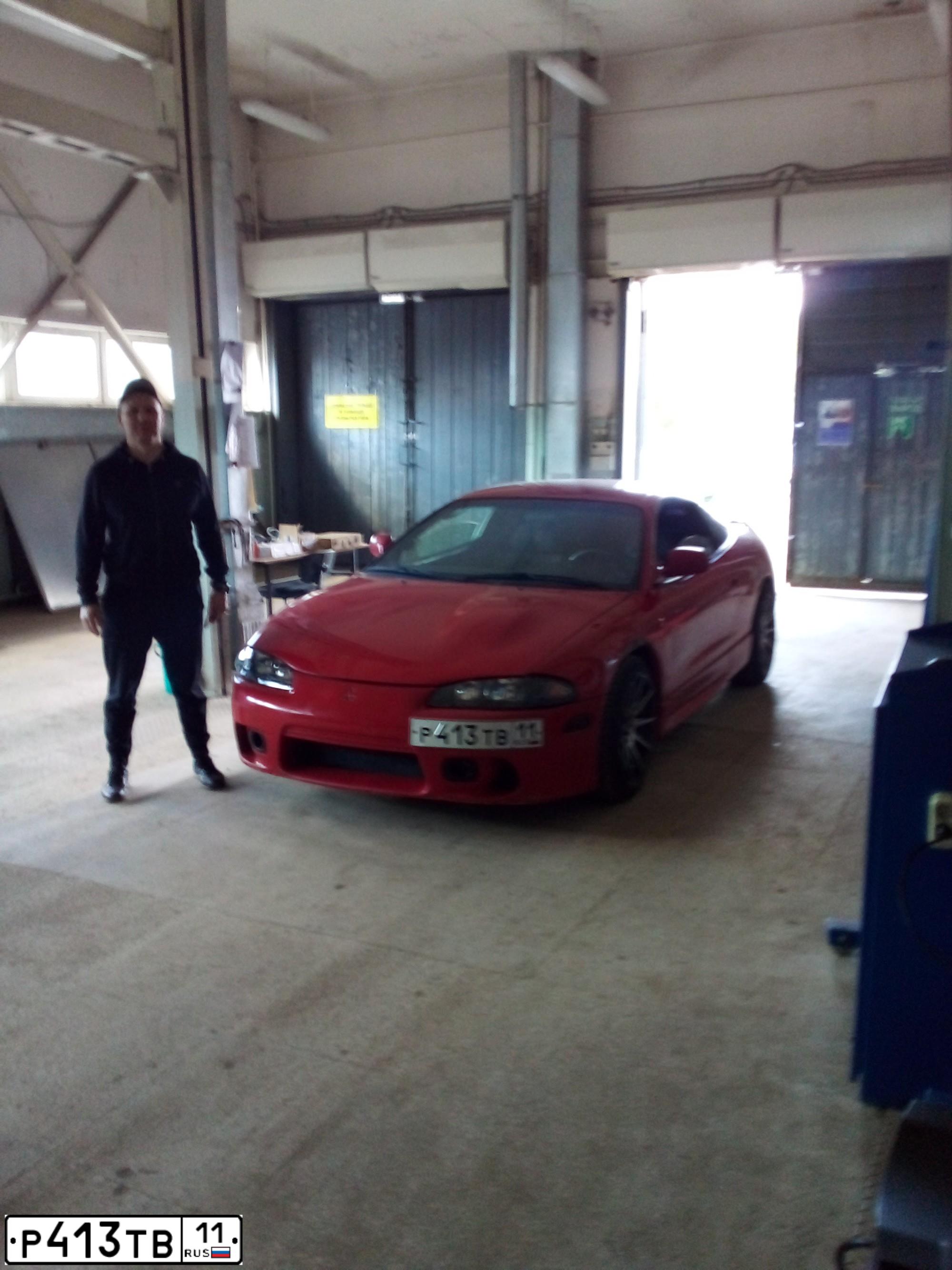 Фото автомобиля MITSUBISHI ECLIPSE, 1998 — госномер А005ЕХ34. Цвет: Красный