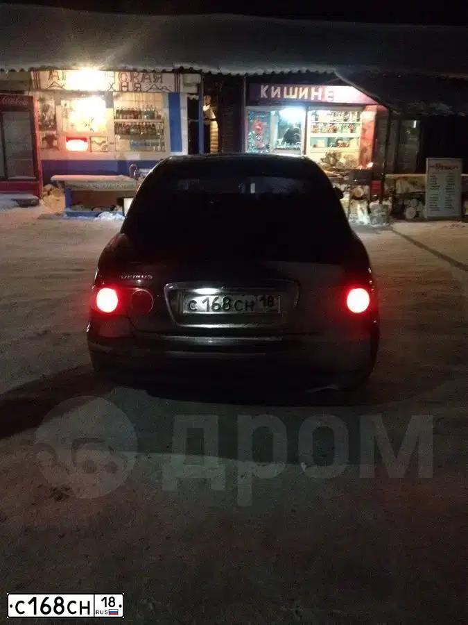 Фото автомобиля KIA OPIRUS, 2005 — госномер Н454МН18. Цвет: ТЕМНО-СЕРЫЙ
