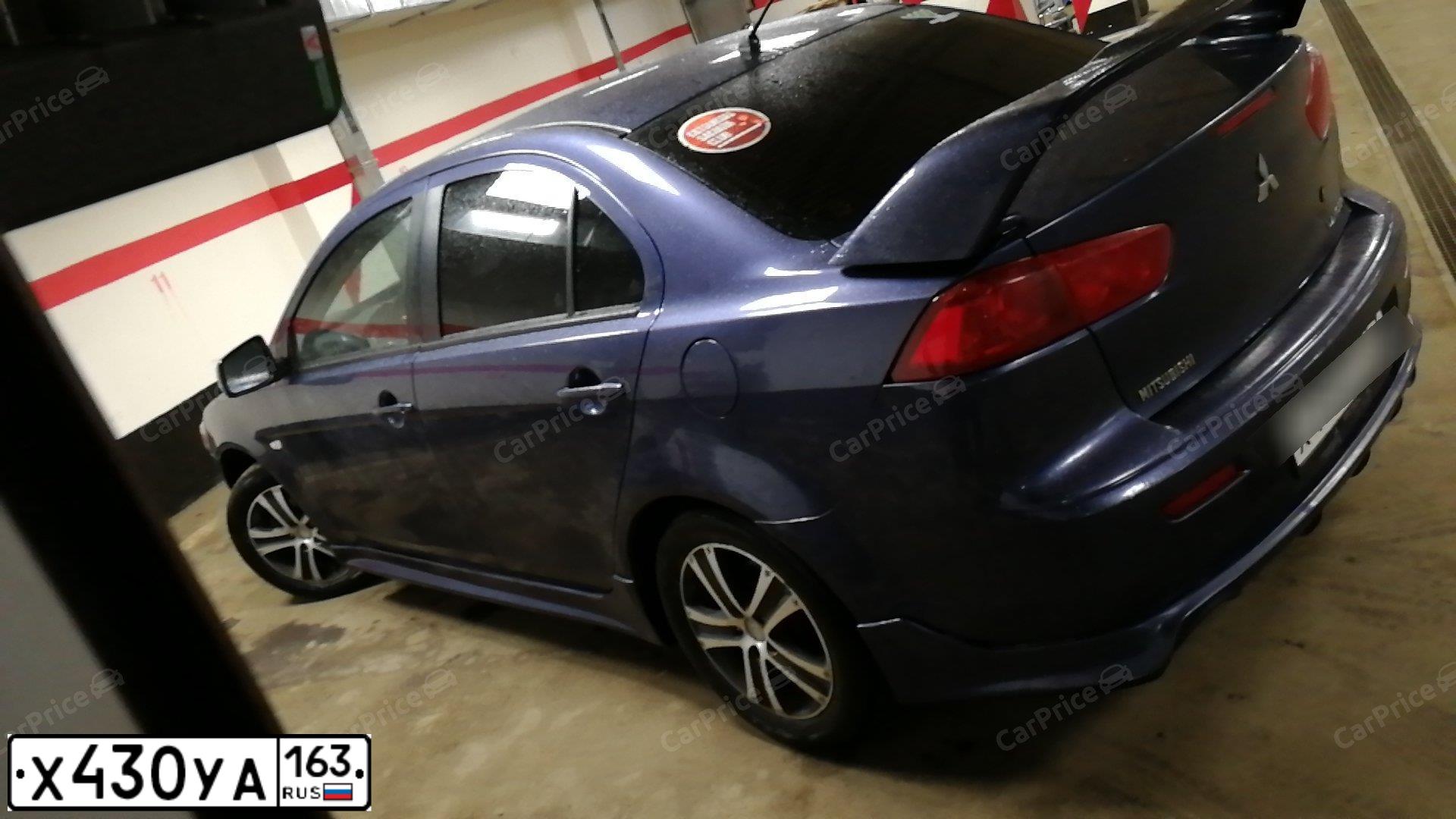 Фото автомобиля MITSUBISHI LANCER, 2008 — госномер М428КУ73. Цвет: синий