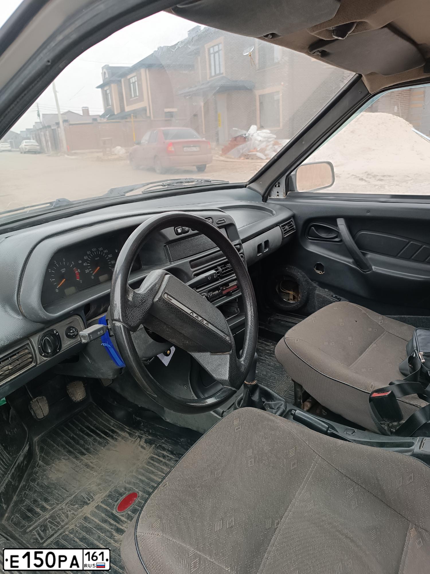 Фото автомобиля LADA 2114 SAMARA, 2004 — госномер Е150РА161. Цвет: Серый