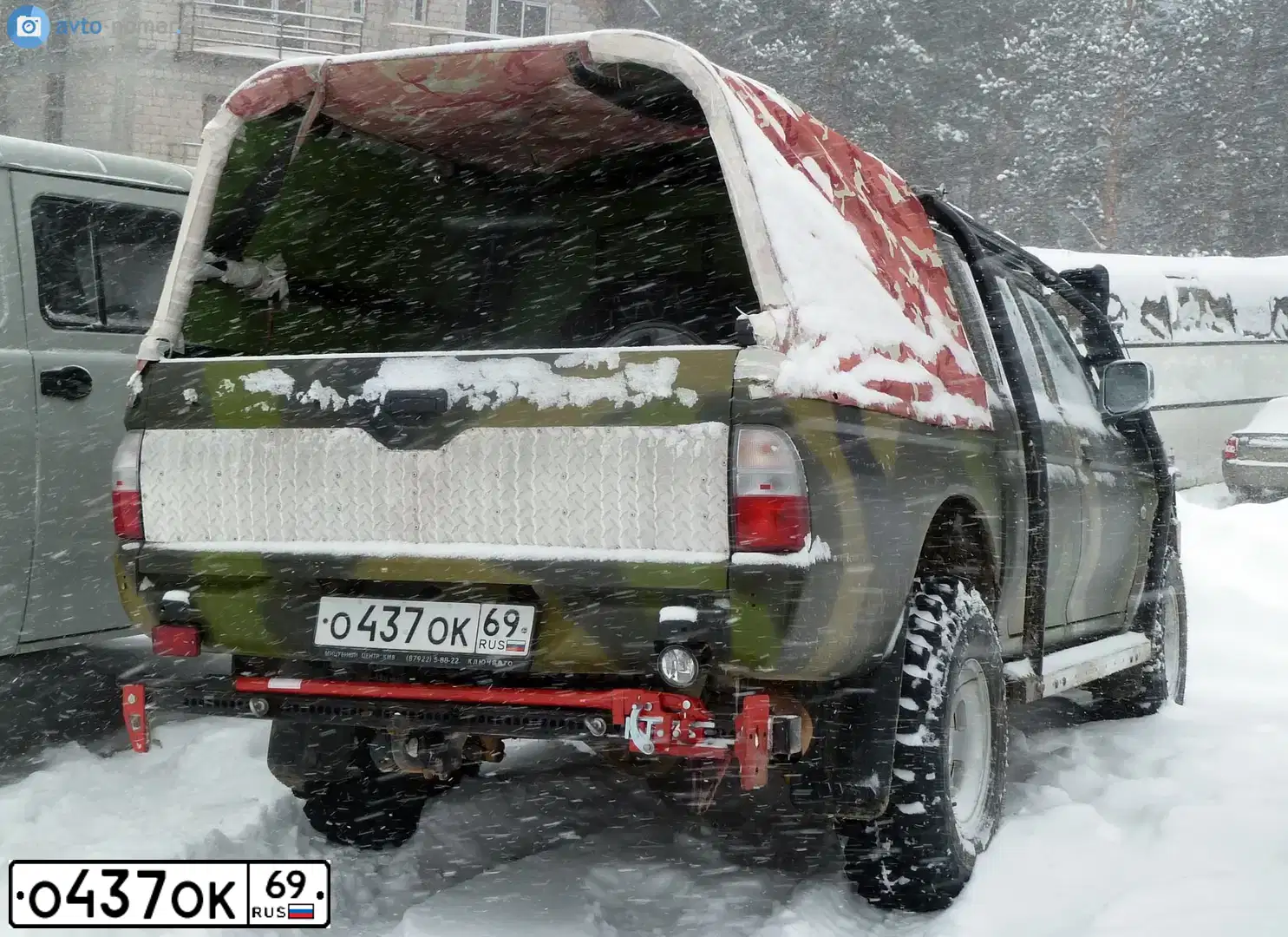 Фото автомобиля MITSUBISHI L 200, 2006 — госномер О437ОК69. Цвет: ЗЕЛЕНО-ЧЕРНЫЙ