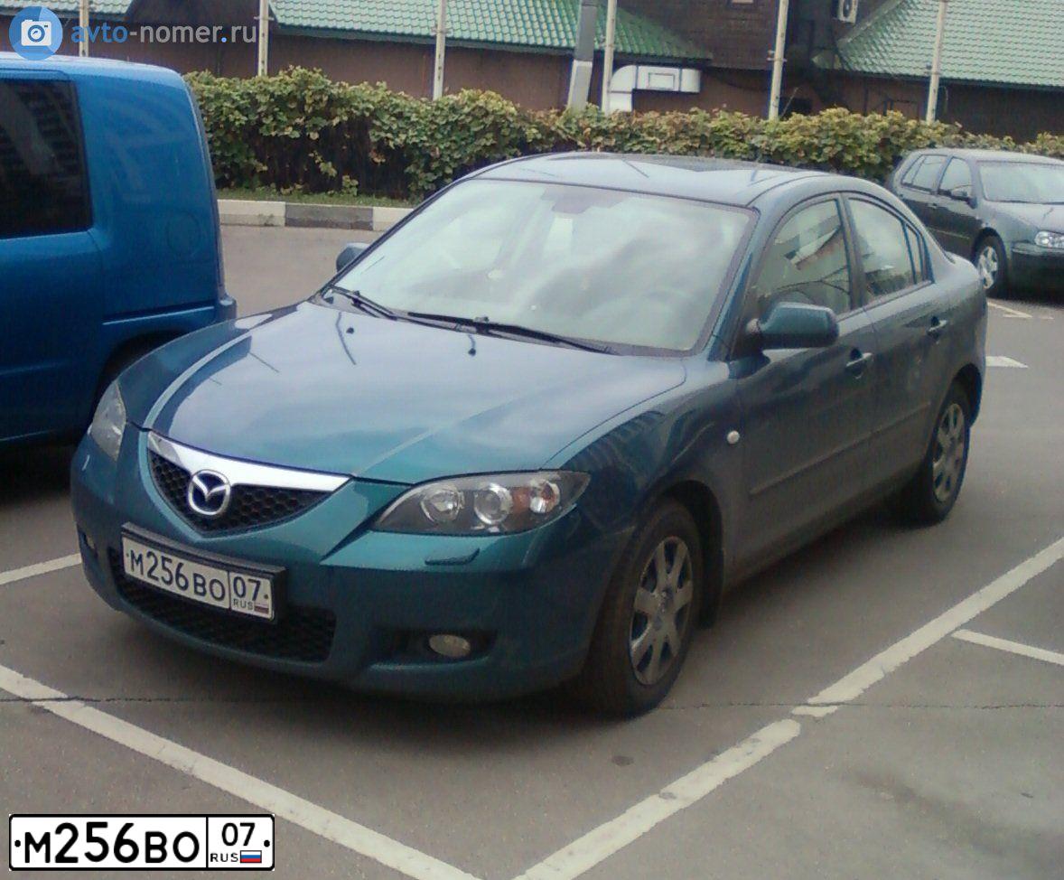 Фото автомобиля MAZDA 3, 2007 — госномер А107УА124. Цвет: сине-зеленый