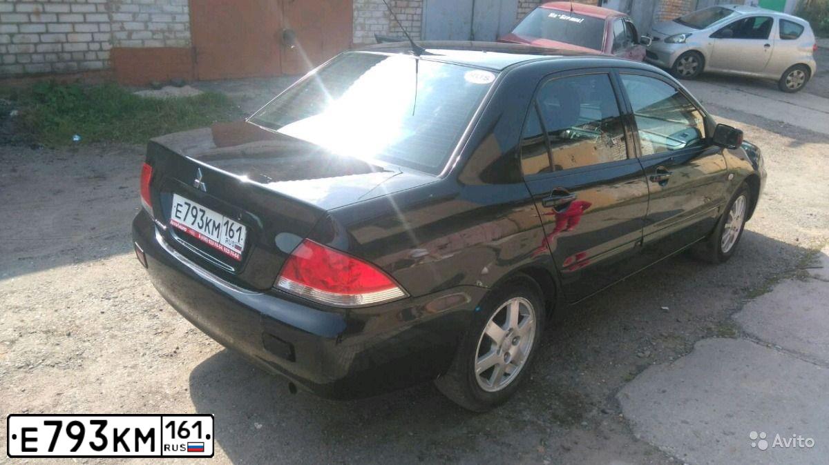 Фото автомобиля MITSUBISHI LANCER, 2006 — госномер О317УО32. Цвет: ЧЕРНЫЙ