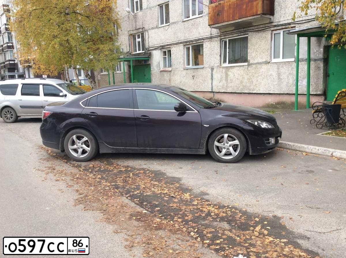 Фото автомобиля MAZDA 6, 2007 — госномер К061ВЕ186. Цвет: ТЕМНО-ВИШНЕВЫЙ