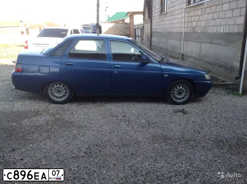 Фото автомобиля LADA 2110, 2005 — госномер Т214ЕУ62. Цвет: Сине-зеленый