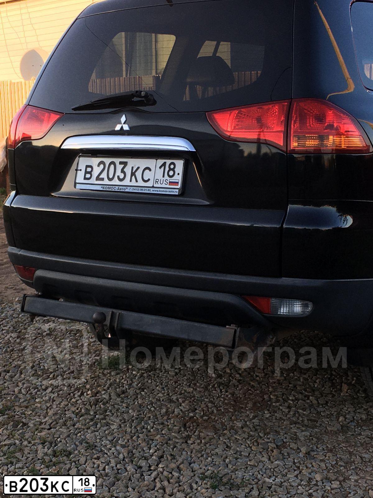 Фото автомобиля MITSUBISHI PAJERO SPORT, 2010 — госномер В203КС18. Цвет: ЧЕРНЫЙ