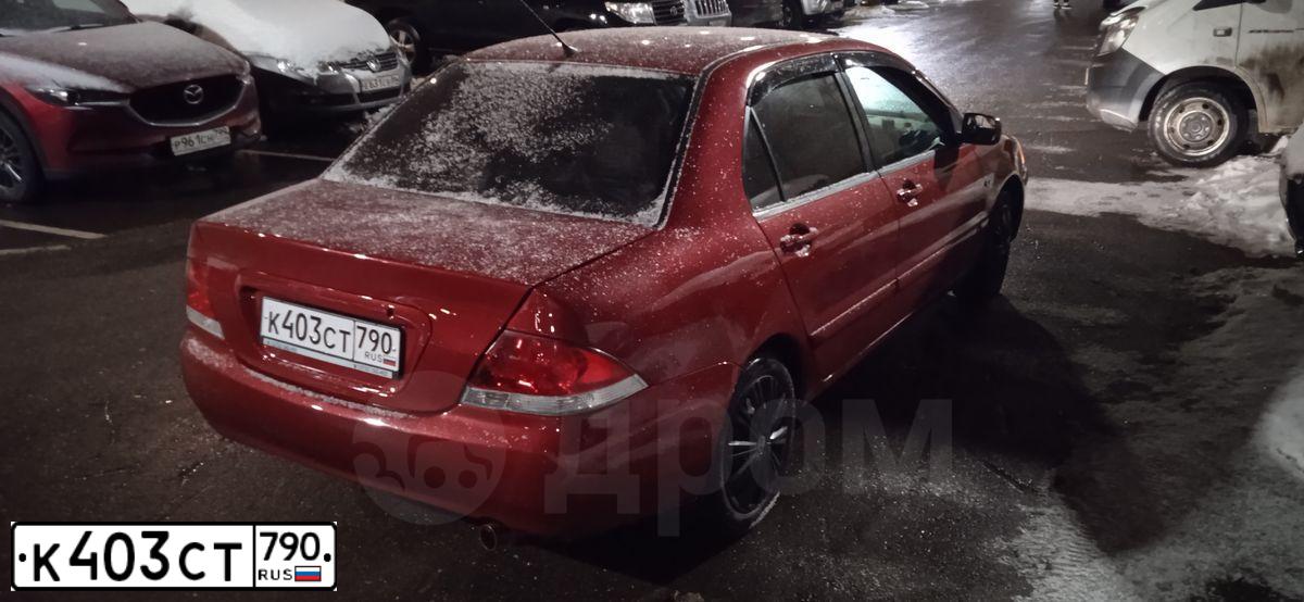 Фото автомобиля MITSUBISHI LANCER, 2005 — госномер К403СТ790. Цвет: Красный