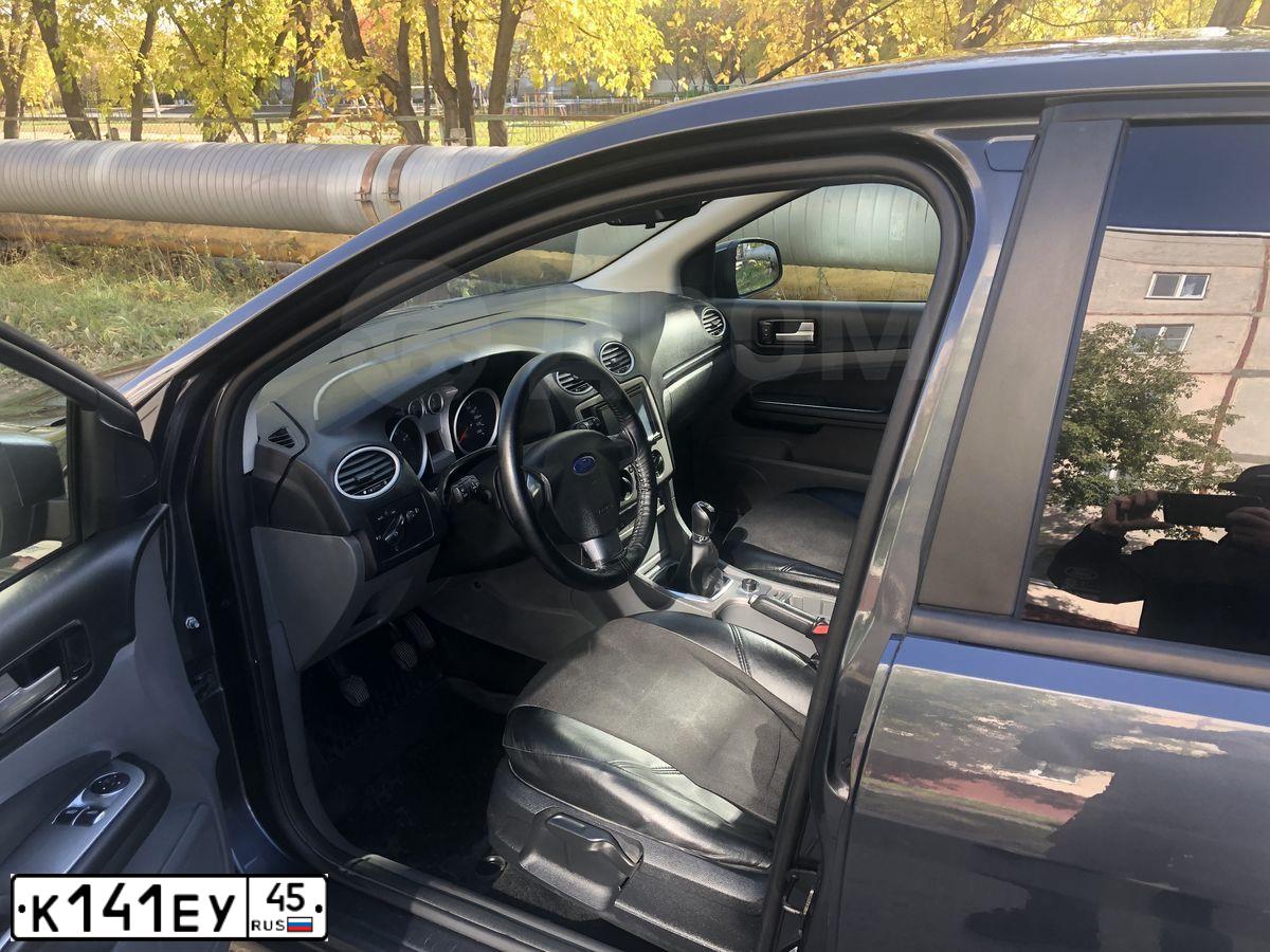 Фото автомобиля FORD FOCUS, 2010 — госномер Т065ЕР72. Цвет: ТЕМНО-СЕРЫЙ