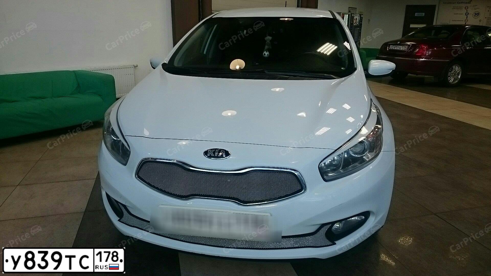 Фото автомобиля KIA CEE'D, 2013 — госномер В542КС180. Цвет: Белый