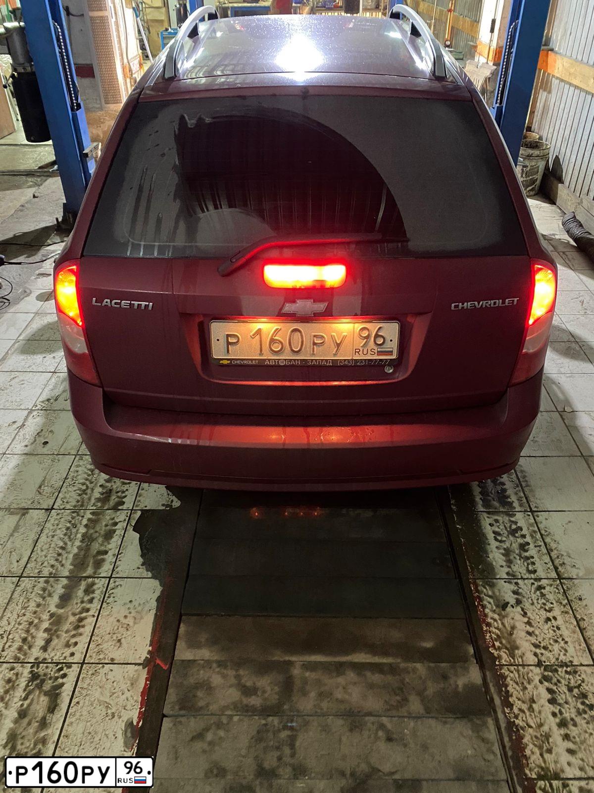 Фото автомобиля CHEVROLET ШЕВРОЛЕ КЛАН (J200/ЛАЧЕТТИ), 2010 — госномер А020РР147. Цвет: Красный