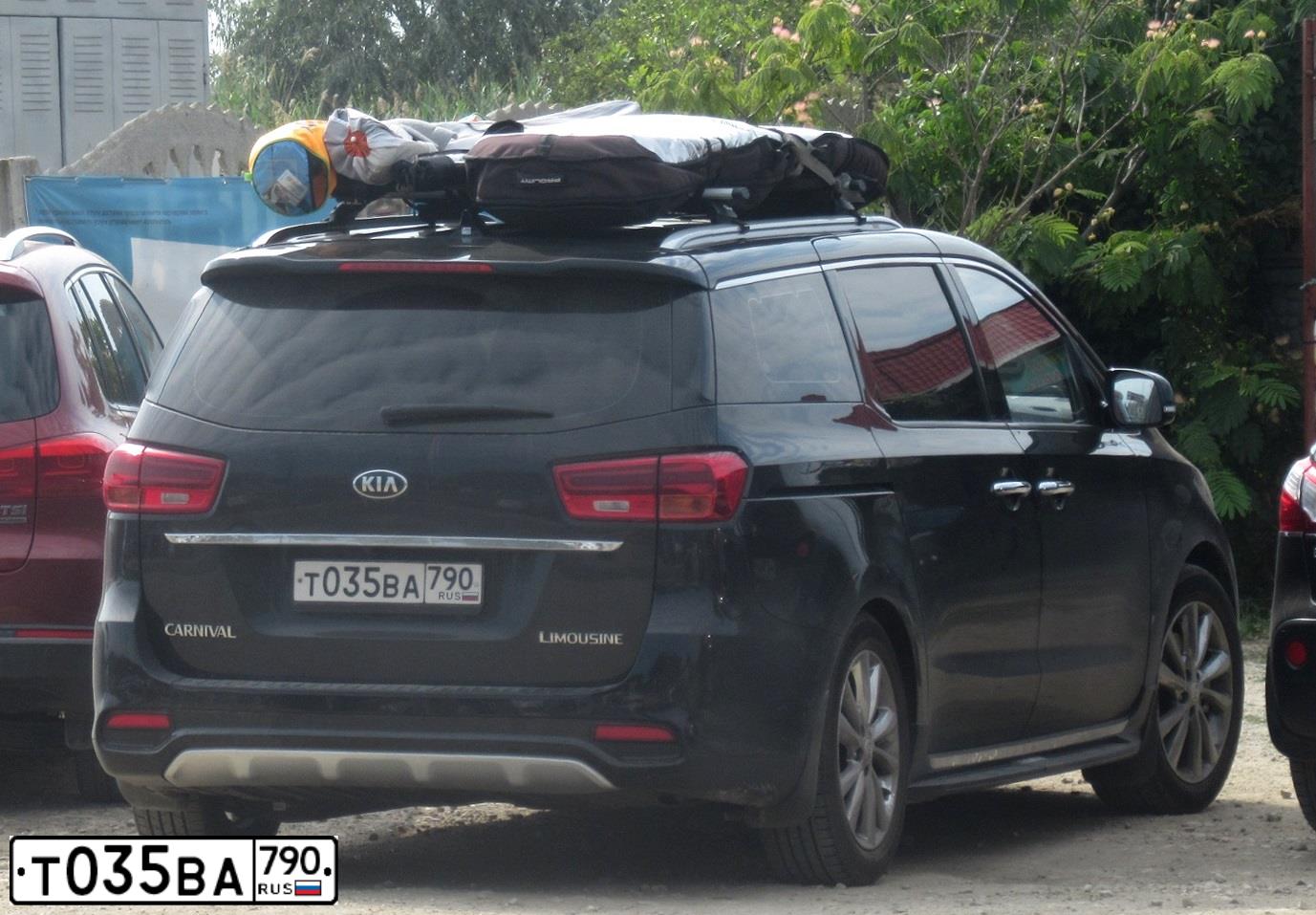 Фото автомобиля KIA CARNIVAL, 2019 — госномер Т035ВА790. Цвет: ЧЕРНЫЙ
