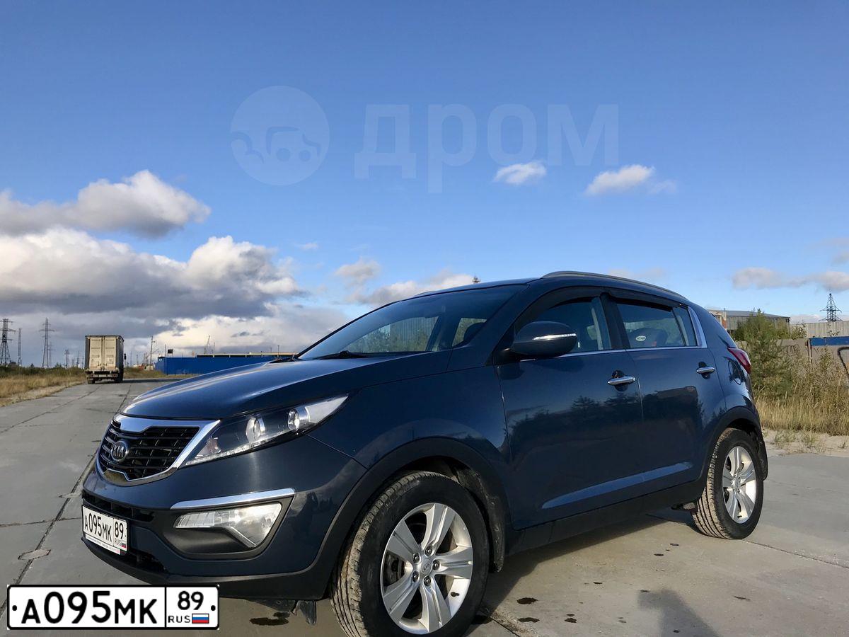 Фото автомобиля КИА SLS (SPORTAGE,SL,SLS), 2011 — госномер К663СХ702. Цвет: синий