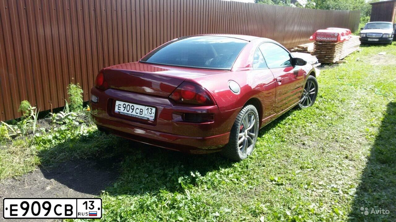 Фото автомобиля MITSUBISHI ECLIPSE, 2001 — госномер Е909СВ13. Цвет: ЧЕРНЫЙ