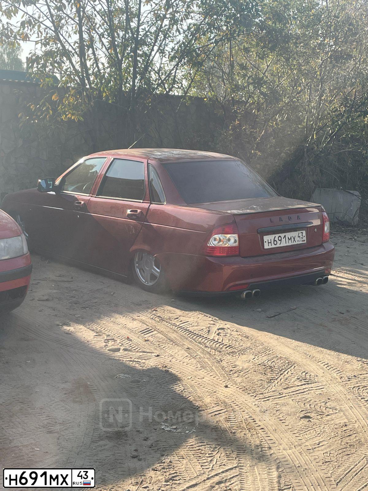 Фото автомобиля LADA 2170 PRIORA, 2008 — госномер Н691МХ43. Цвет: ЗОЛОТИСТО-КРАСНЫЙ