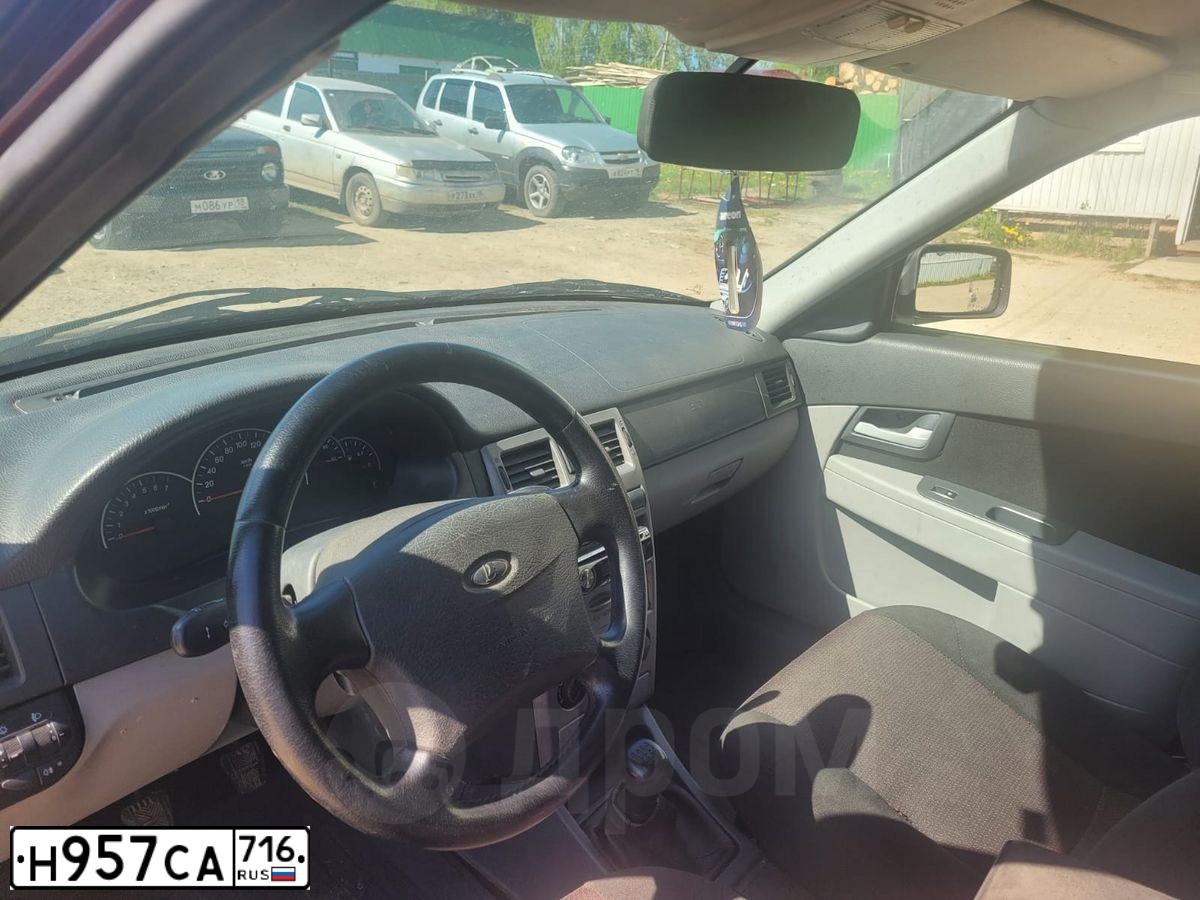 Фото автомобиля LADA 2172 PRIORA, 2009 — госномер Н306НУ18. Цвет: ТЕМНО-ВИШНЕВЫЙ