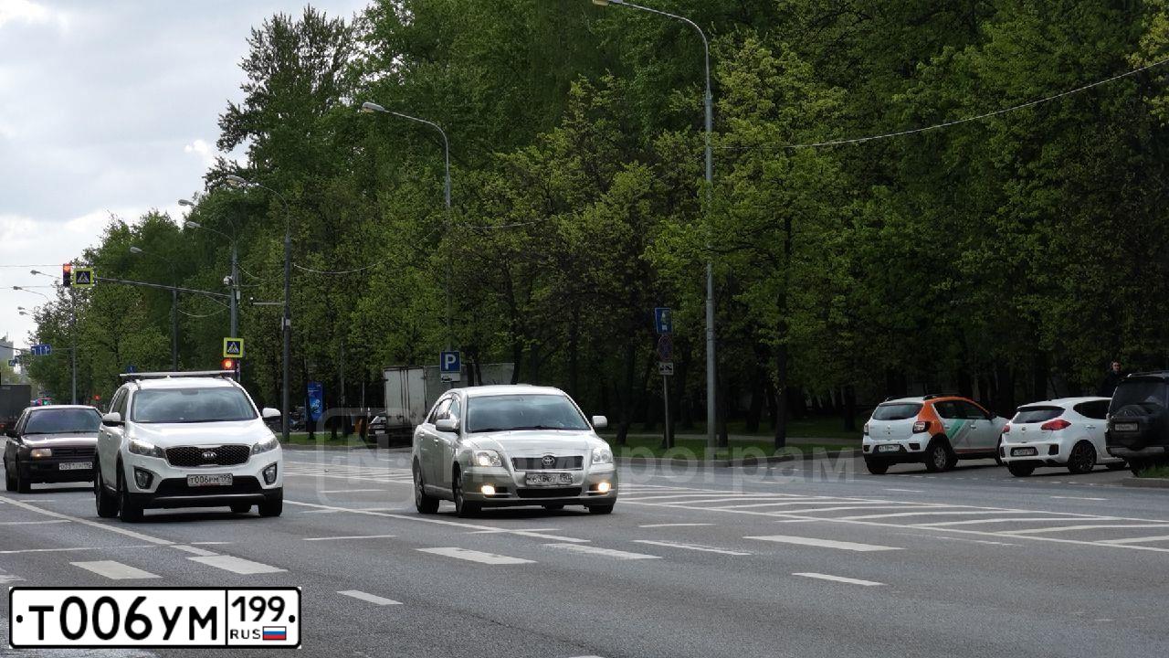 Фото автомобиля HYUNDAI I ELANTRA, 2009 — госномер Т006УМ199. Цвет: ЧЕРНЫЙ
