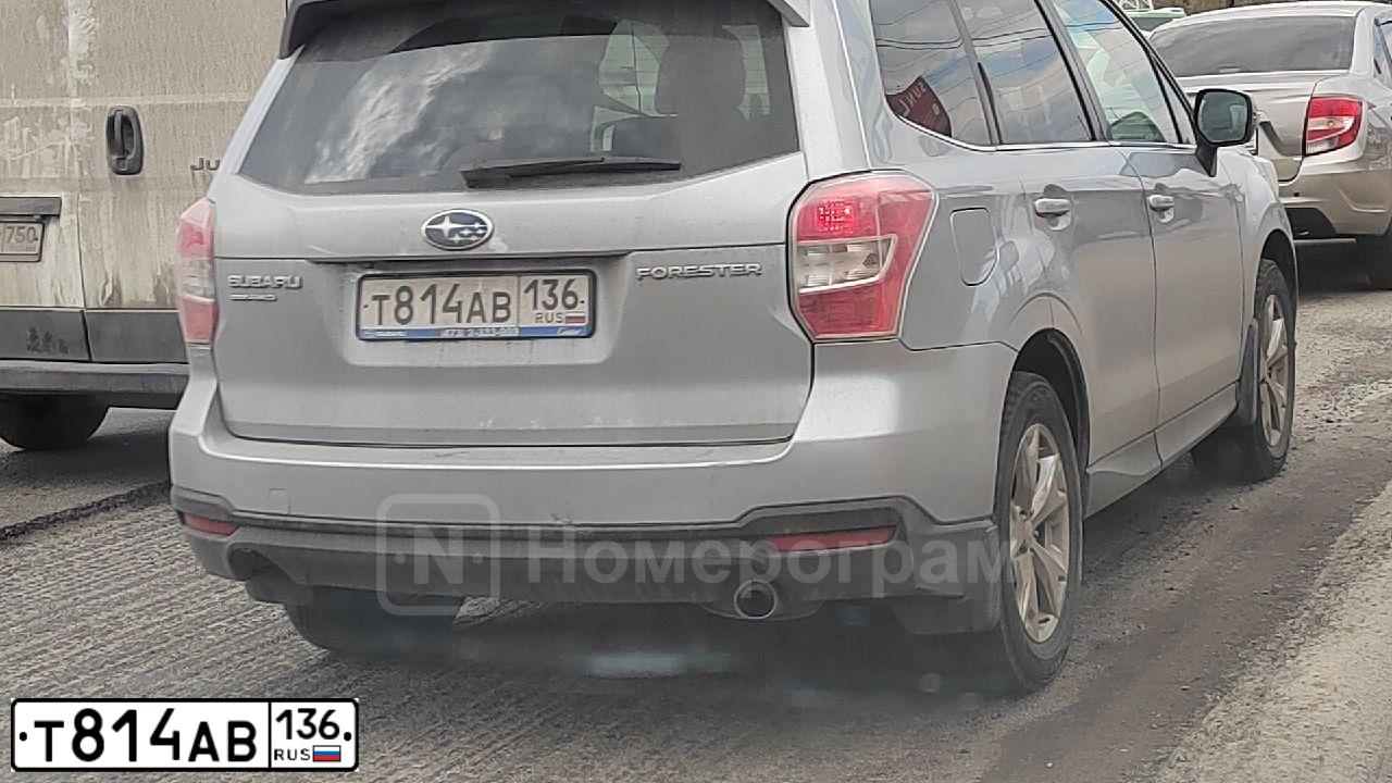 Фото автомобиля SUBARU FORESTER, 2015 — госномер Т814АВ136. Цвет: серебристый