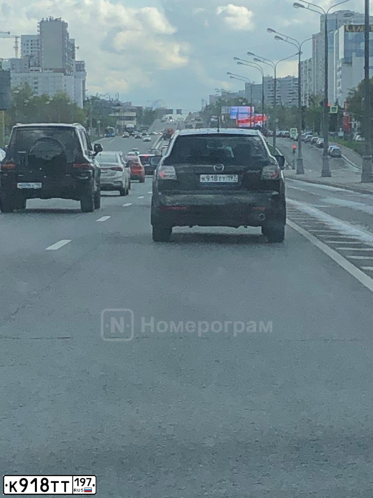 Фото автомобиля MAZDA CX-7, 2011 — госномер К918ТТ197. Цвет: ЧЕРНЫЙ