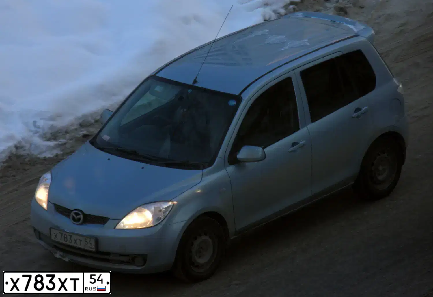 Фото автомобиля MAZDA DEMIO, 2007 — госномер Х783ХТ54