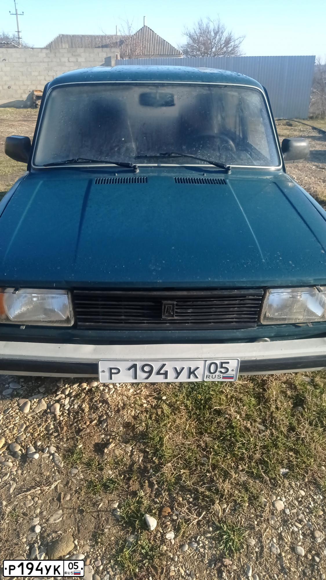 Фото автомобиля LADA 2104, 1998 — госномер Р194УК05. Цвет: СИНЕ-ЗЕЛЕНЫЙ