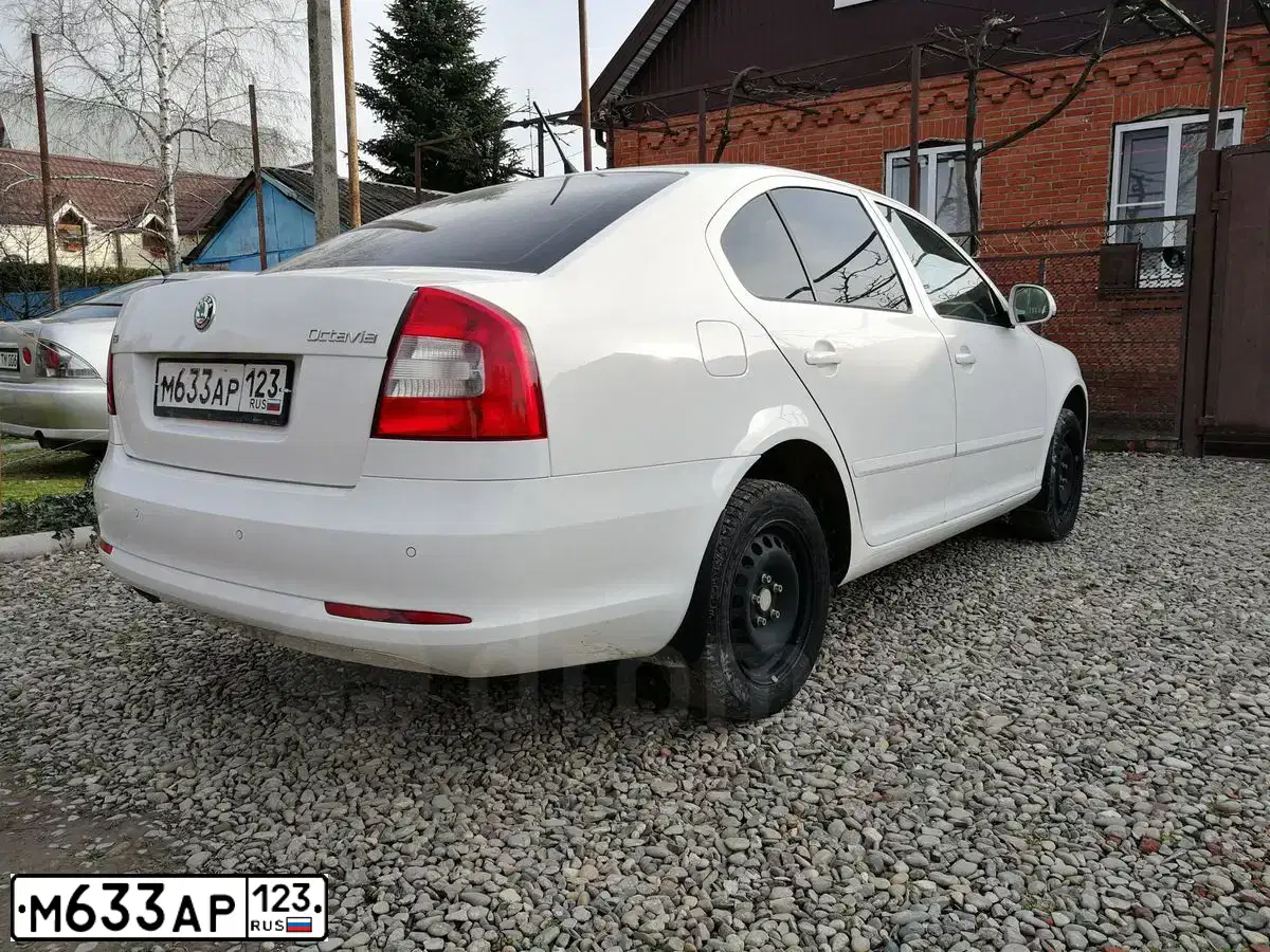 Фото автомобиля SKODA OCTAVIA, 2011 — госномер К354АА126. Цвет: Белый