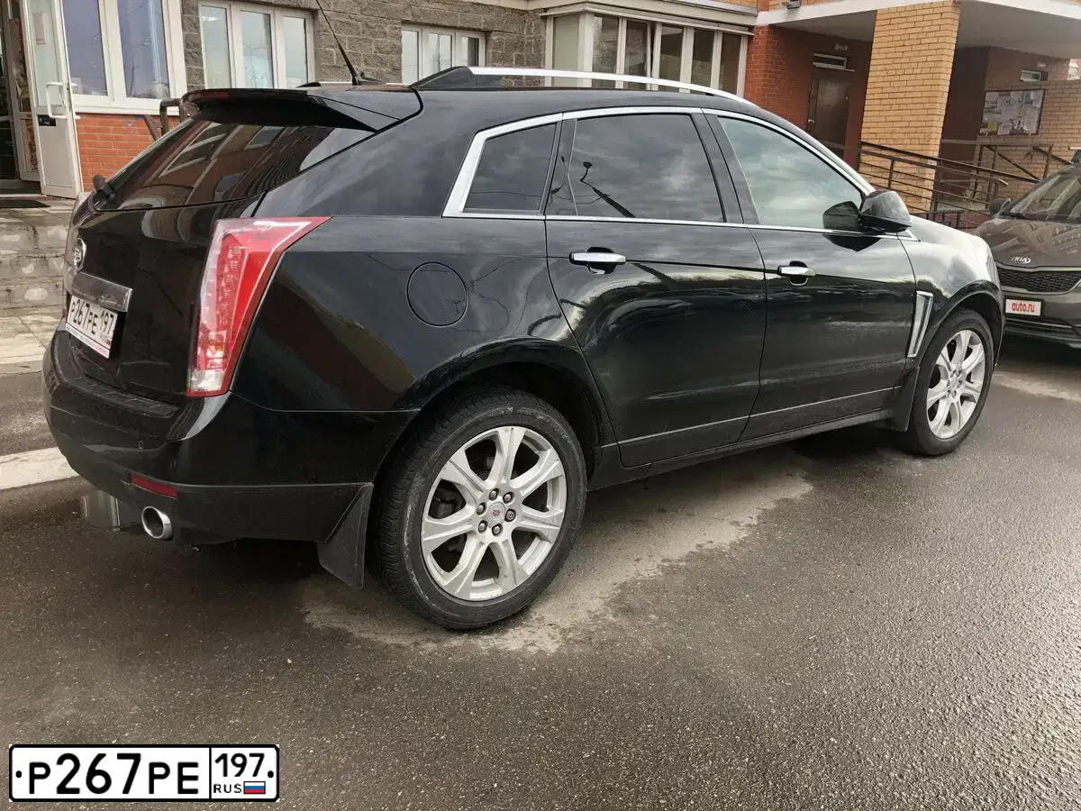 Фото автомобиля CADILLAC SRX, 2015 — госномер Р267РЕ197. Цвет: ЧЕРНЫЙ