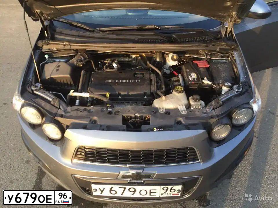 Фото автомобиля CHEVROLET AVEO, 2013 — госномер Н150ВХ323. Цвет: СЕРЫЙ