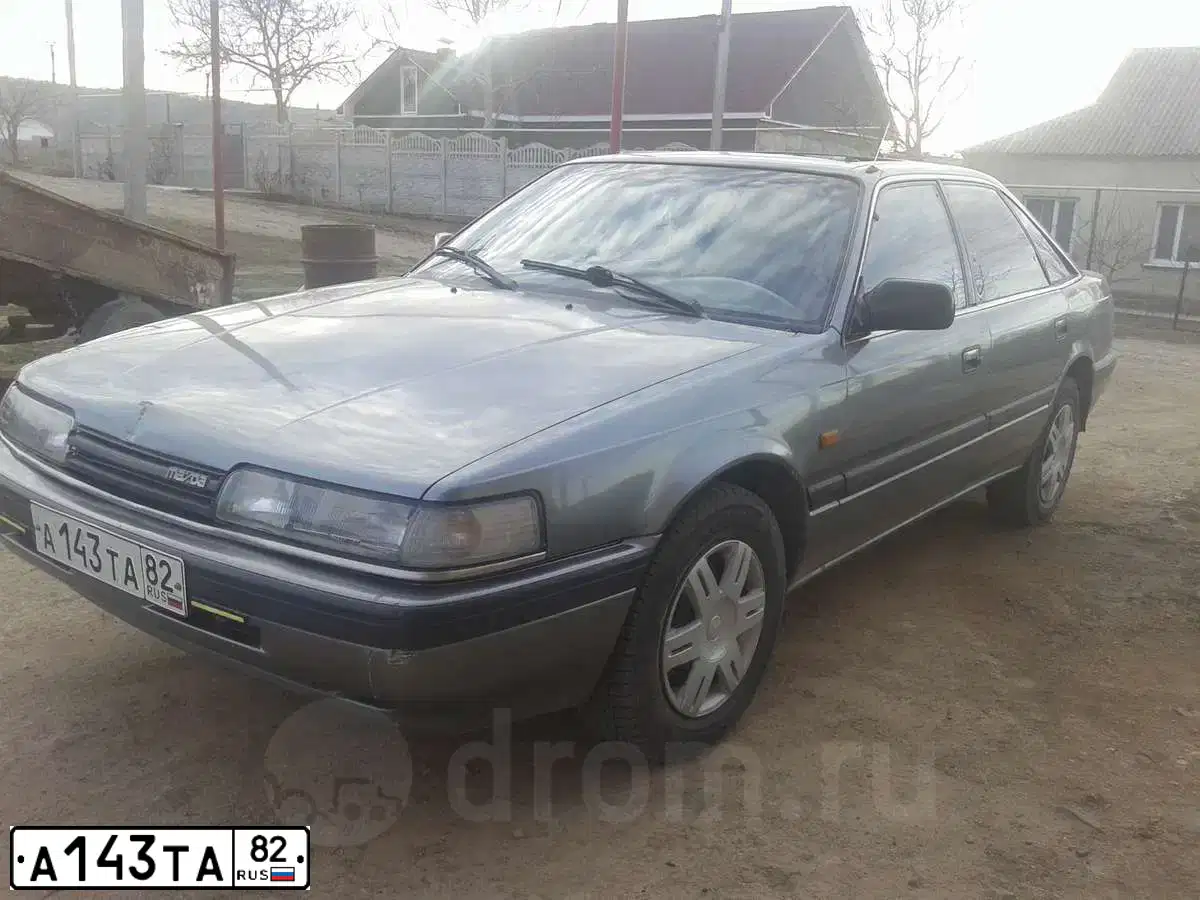 Фото автомобиля МАЗДА 626, 1988 — госномер А143ТА82. Цвет: СЕРЫЙ