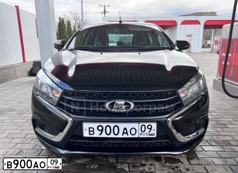 Фото автомобиля LADA VESTA, 2017 — госномер Е170АТ09. Цвет: ЧЕРНЫЙ