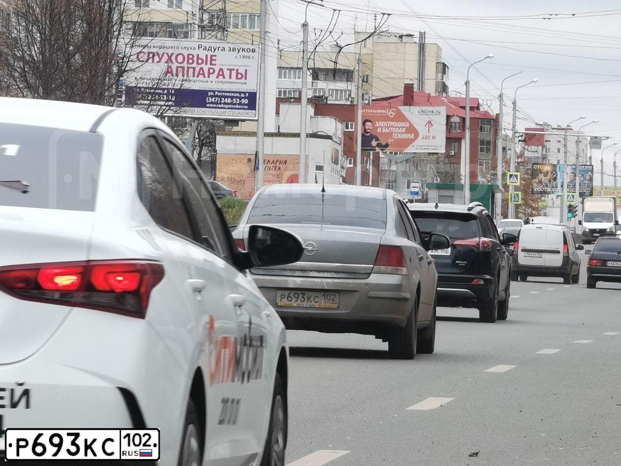 Фото автомобиля OPEL ASTRA, 2013 — госномер К490НО702. Цвет: СЕРЫЙ