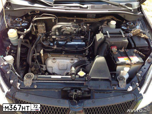 Фото автомобиля MITSUBISHI LANCER, 2005 — госномер А400СН72. Цвет: ЧЕРНЫЙ