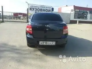 Фото автомобиля LADA 2190 GRANTA, 2013 — госномер Н344СН21. Цвет: Серо-Синий