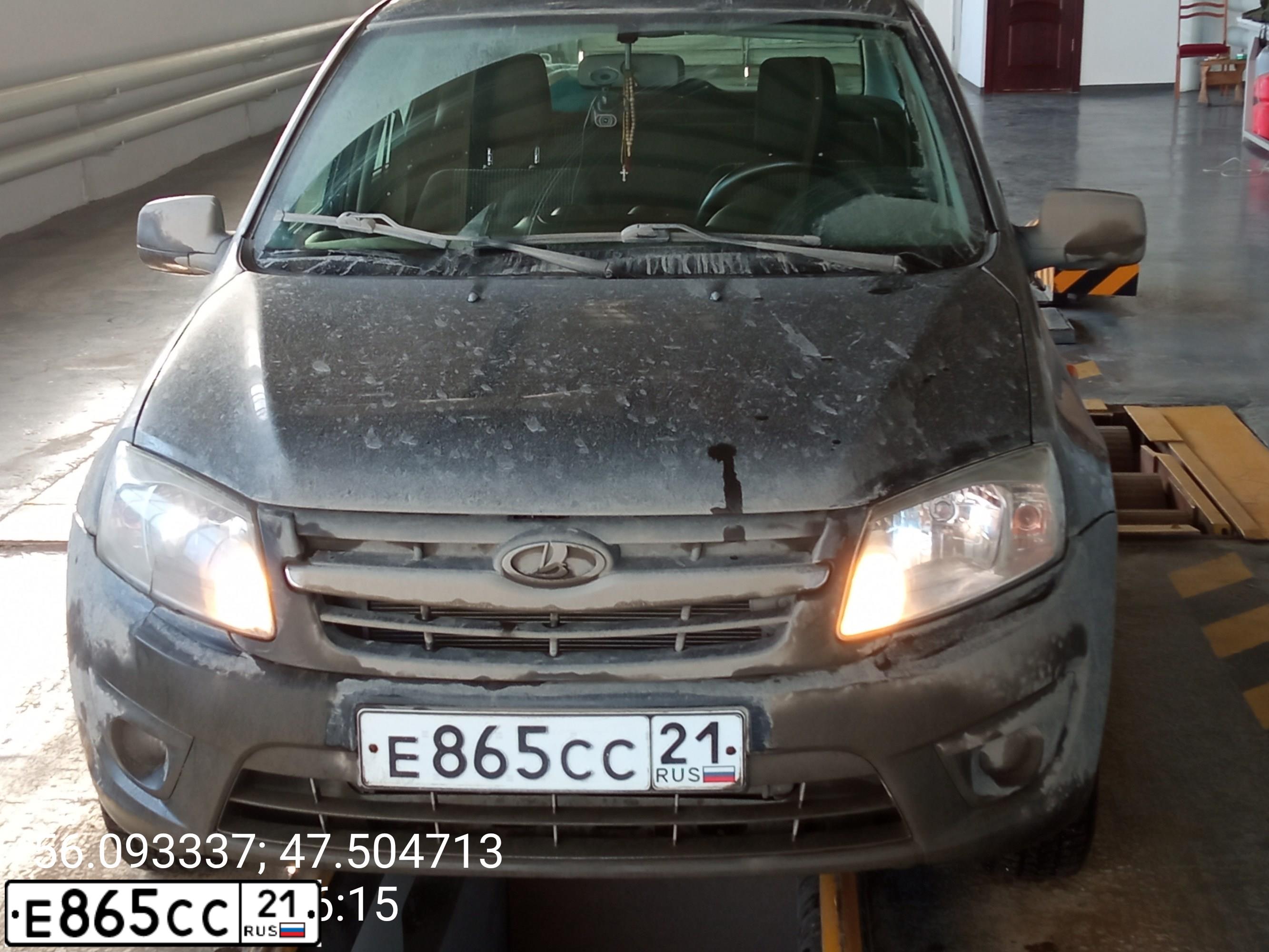 Фото автомобиля LADA 2190 GRANTA, 2013 — госномер Е865СС21. Цвет: Сине-Черный