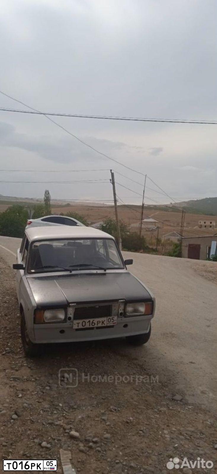 Фото автомобиля LADA 2107, 2007 — госномер Х433НУ05. Цвет: ЯРКО БЕЛЫЙ