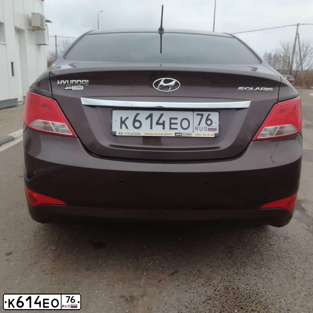 Фото автомобиля HYUNDAI SOLARIS, 2015 — госномер К289ММ35. Цвет: коричневый