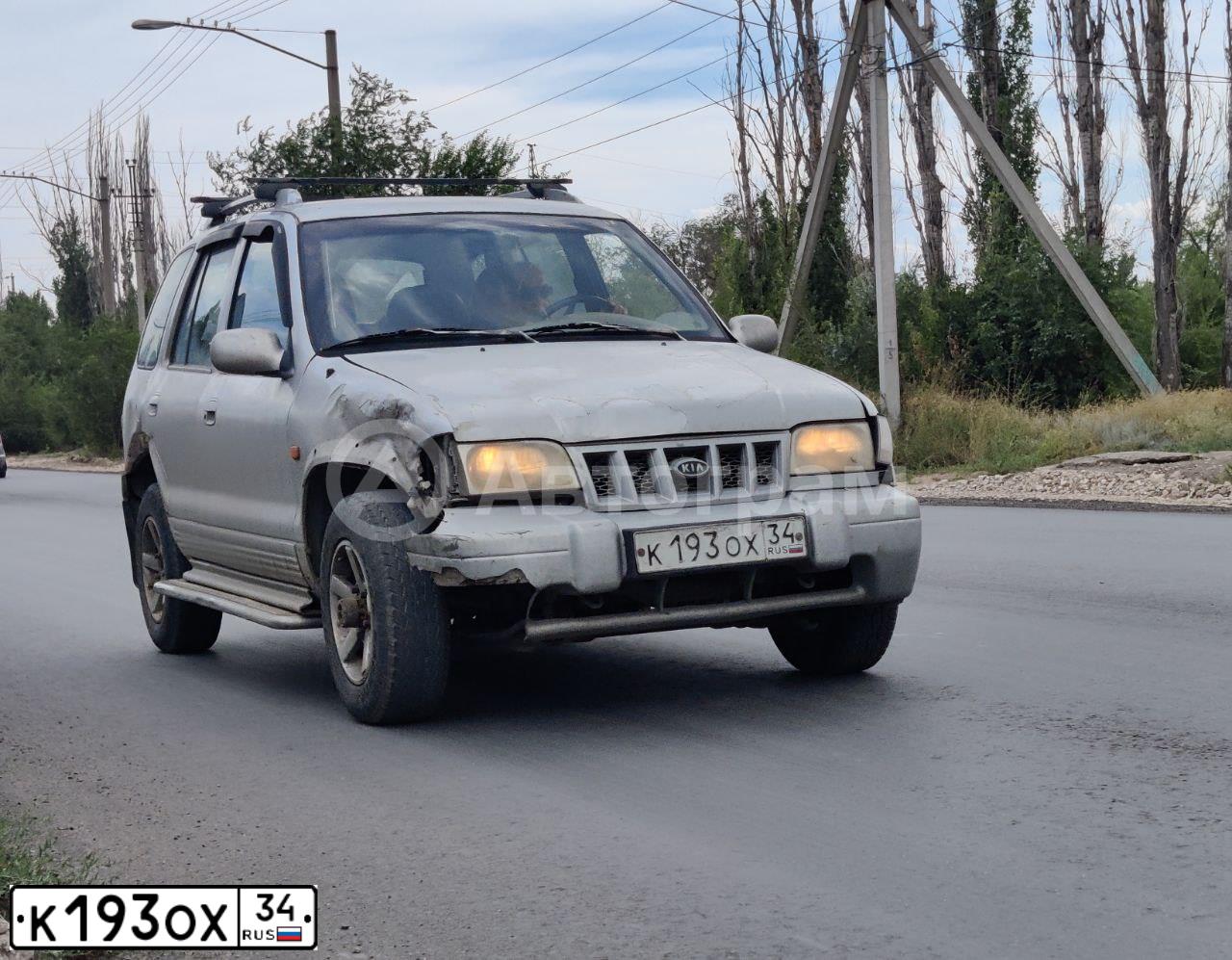 Фото автомобиля KIA SPORTAGE, 2004 — госномер К193ОХ34. Цвет: серебристый