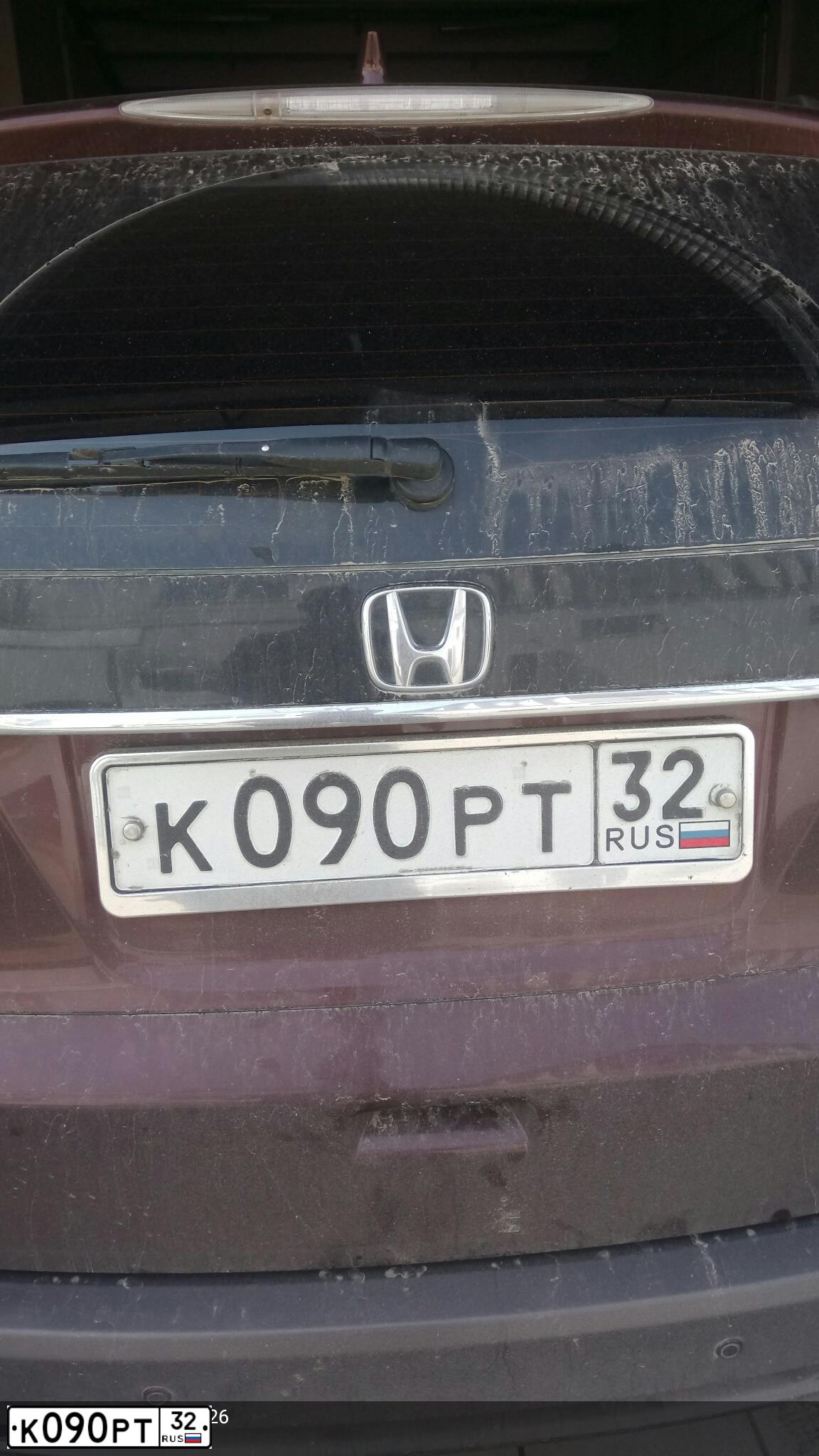 Фото автомобиля FORD KUGA, 2012 — госномер Е012ХК32. Цвет: СЕРЕБРИСТЫЙ