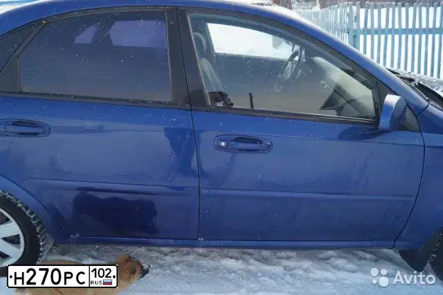 Фото автомобиля CHEVROLET LACETTI, 2006 — госномер Е174ХУ702. Цвет: синий