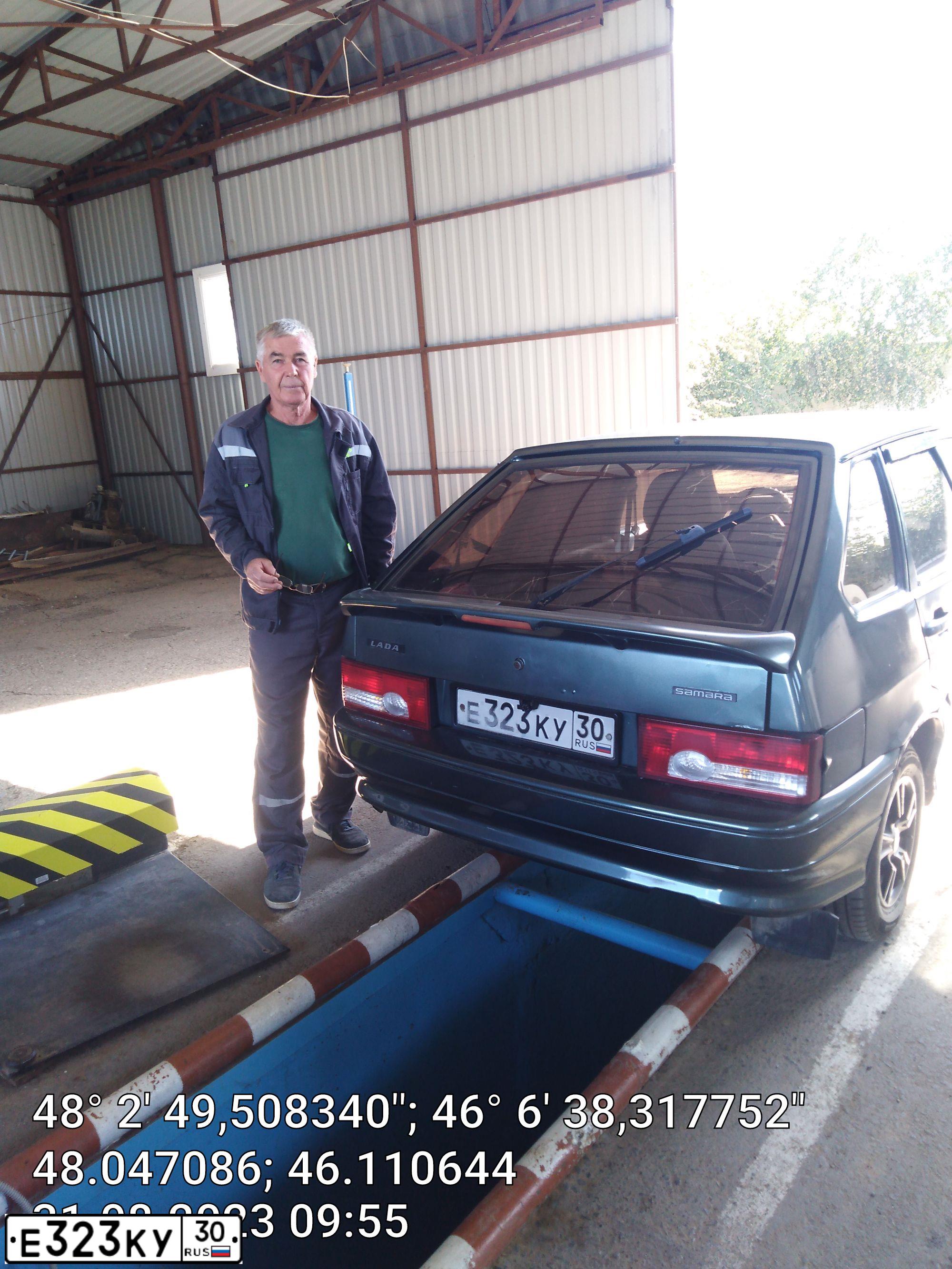 Фото автомобиля LADA 2114 SAMARA, 2009 — госномер Е323КУ30. Цвет: СЕРО-СИНЕ-ЗЕЛЕНЫЙ